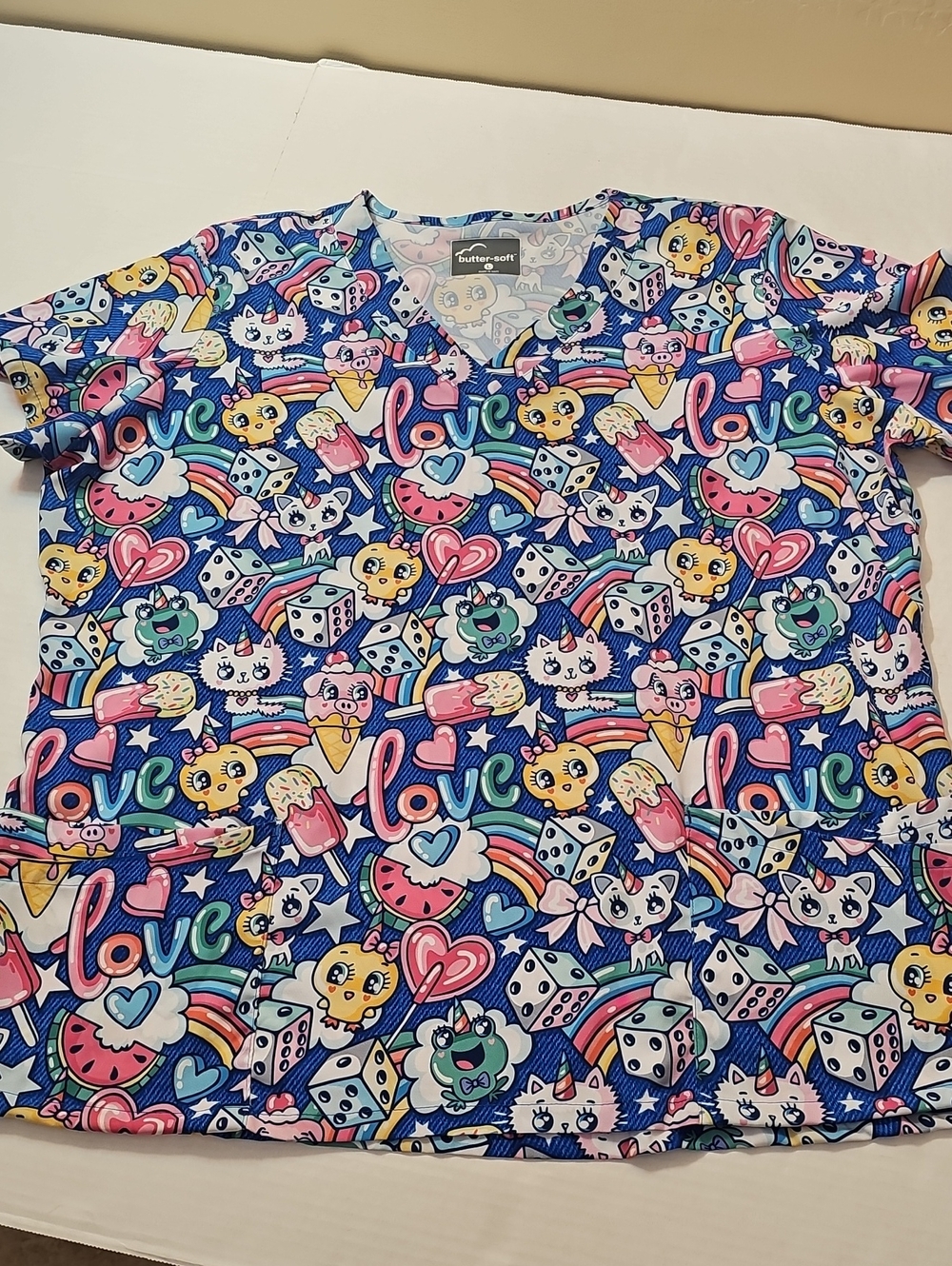 Butter-Soft Blue Graphic Scrubs Tunic Top with Playful Print Size Large